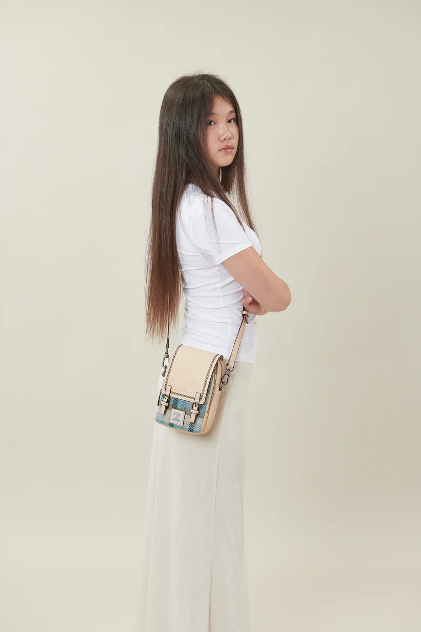 The Baby Jura Crossbody Bag