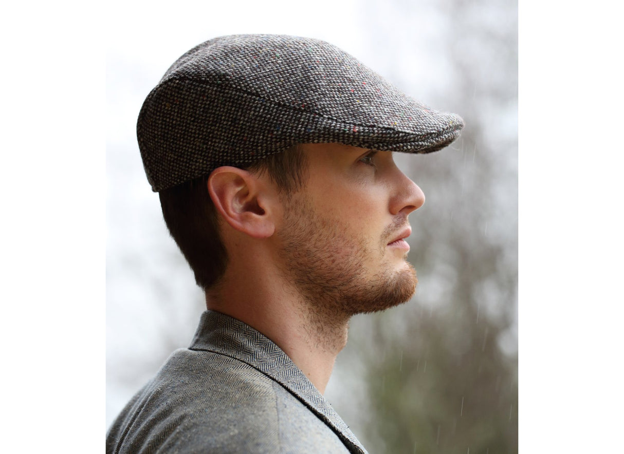 Man wearing a Tweed Donegal Touring Cap by Hanna Hats