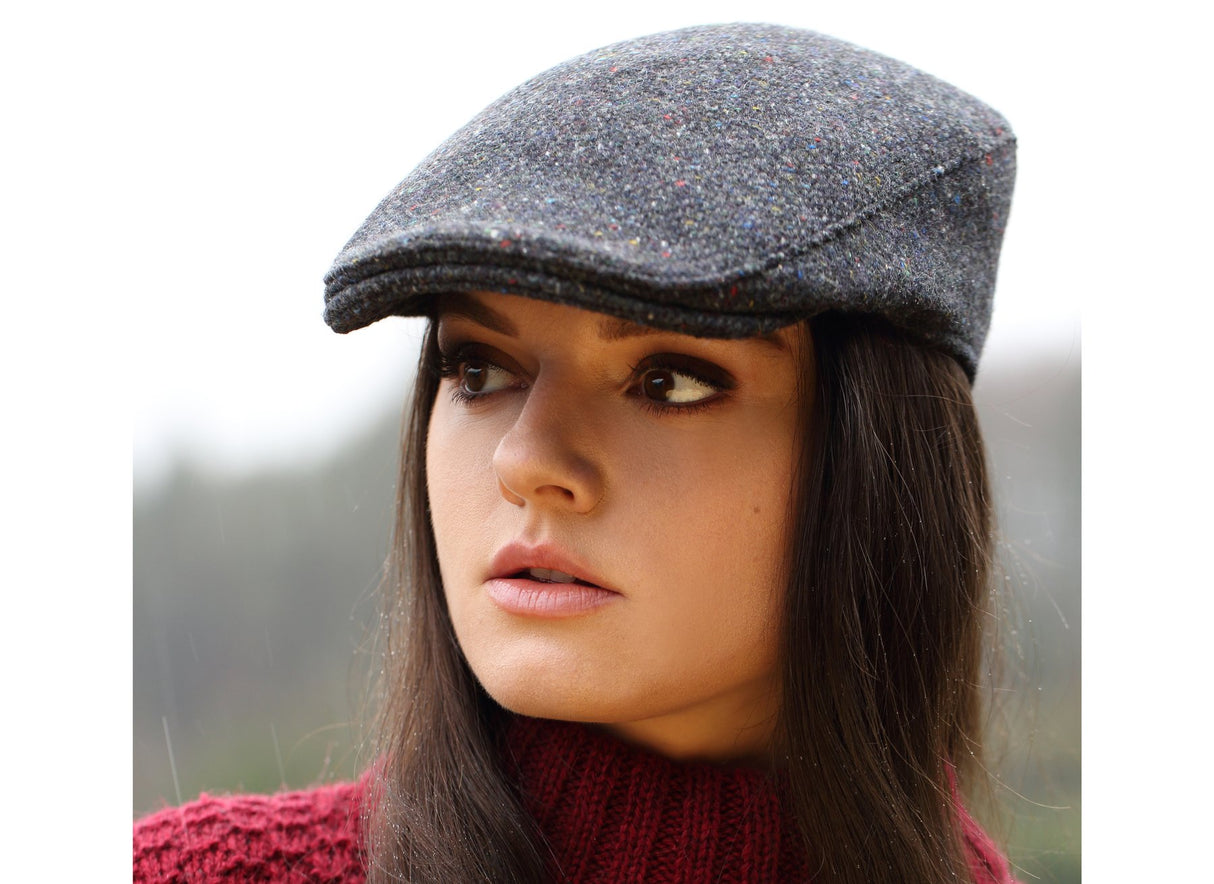 Woman wearing a Tweed Donegal Touring Cap by Hanna Hats