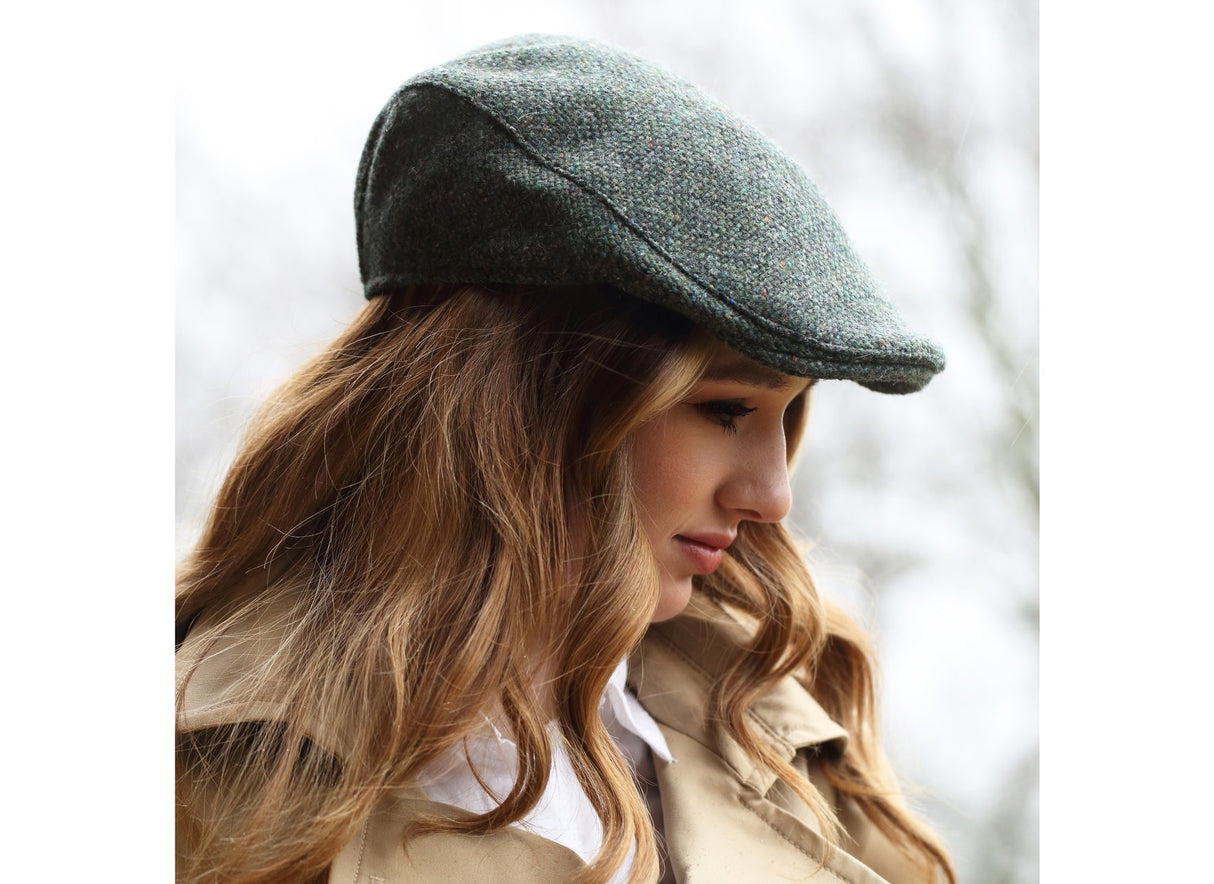 Woman wearing a Tweed Donegal Touring Cap by Hanna Hats