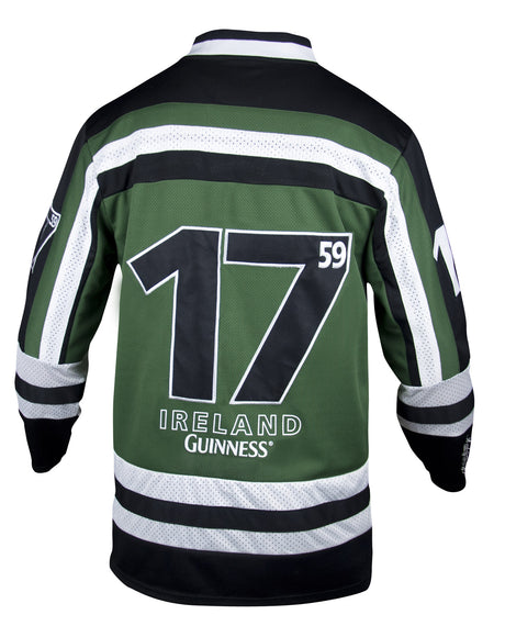 Back view of the Guinness green hockey jersey, long sleeve, mostly dark green, with some black and white also.