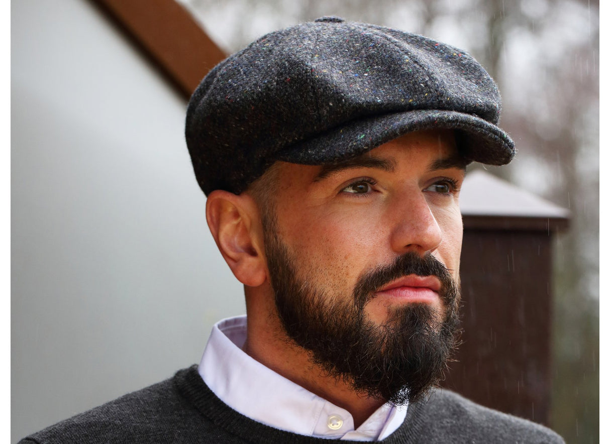 Man wearing Donegal Tweed Peaky Blinders Style Cap by Hanna Hats of Donegal.