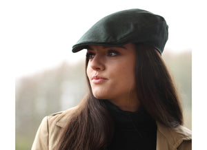 Woman wearing an Irish Linen Donegal Touring Cap by Hanna Hats