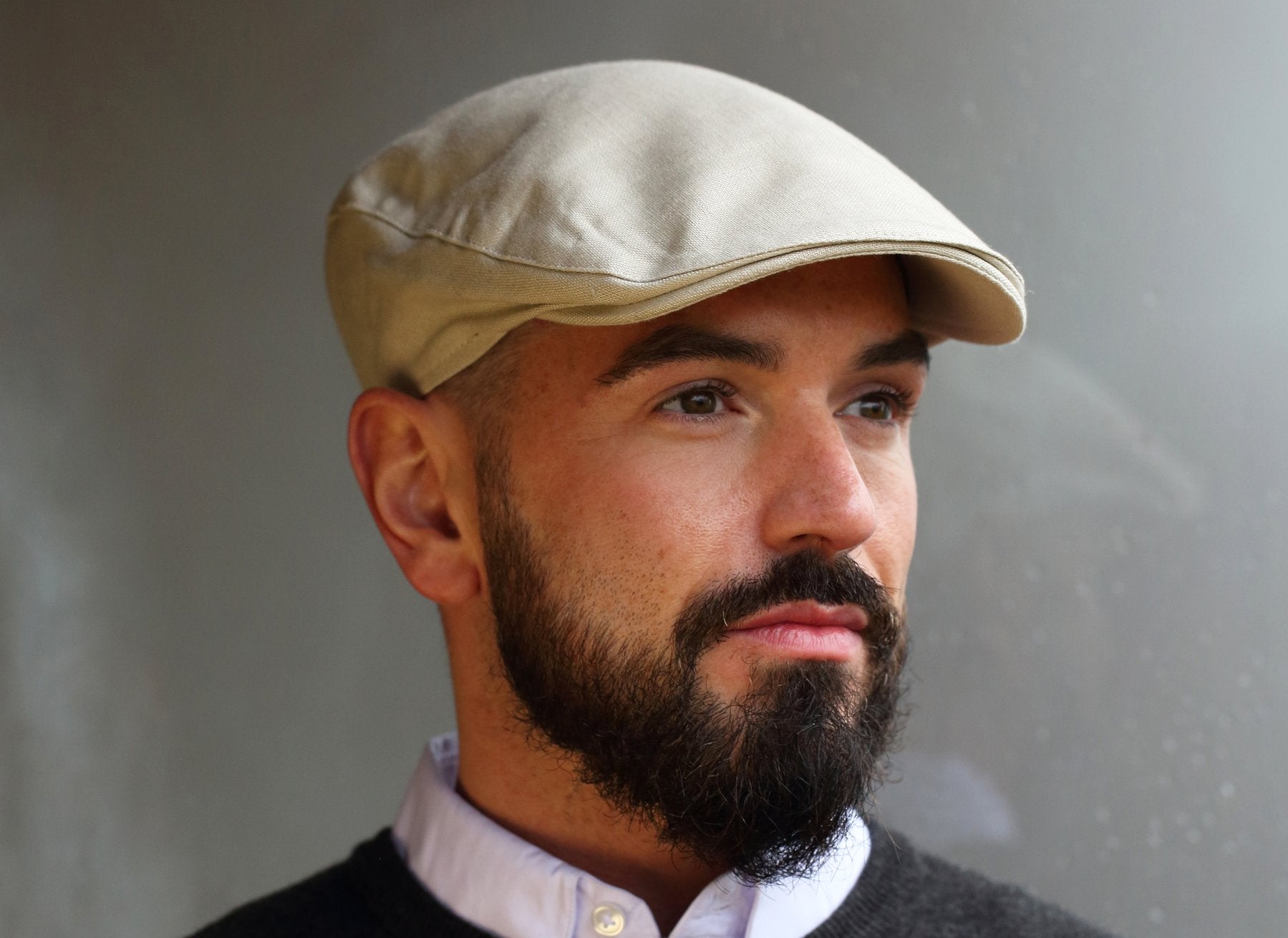 Man wearing an Irish Linen Donegal Touring Cap by Hanna Hats