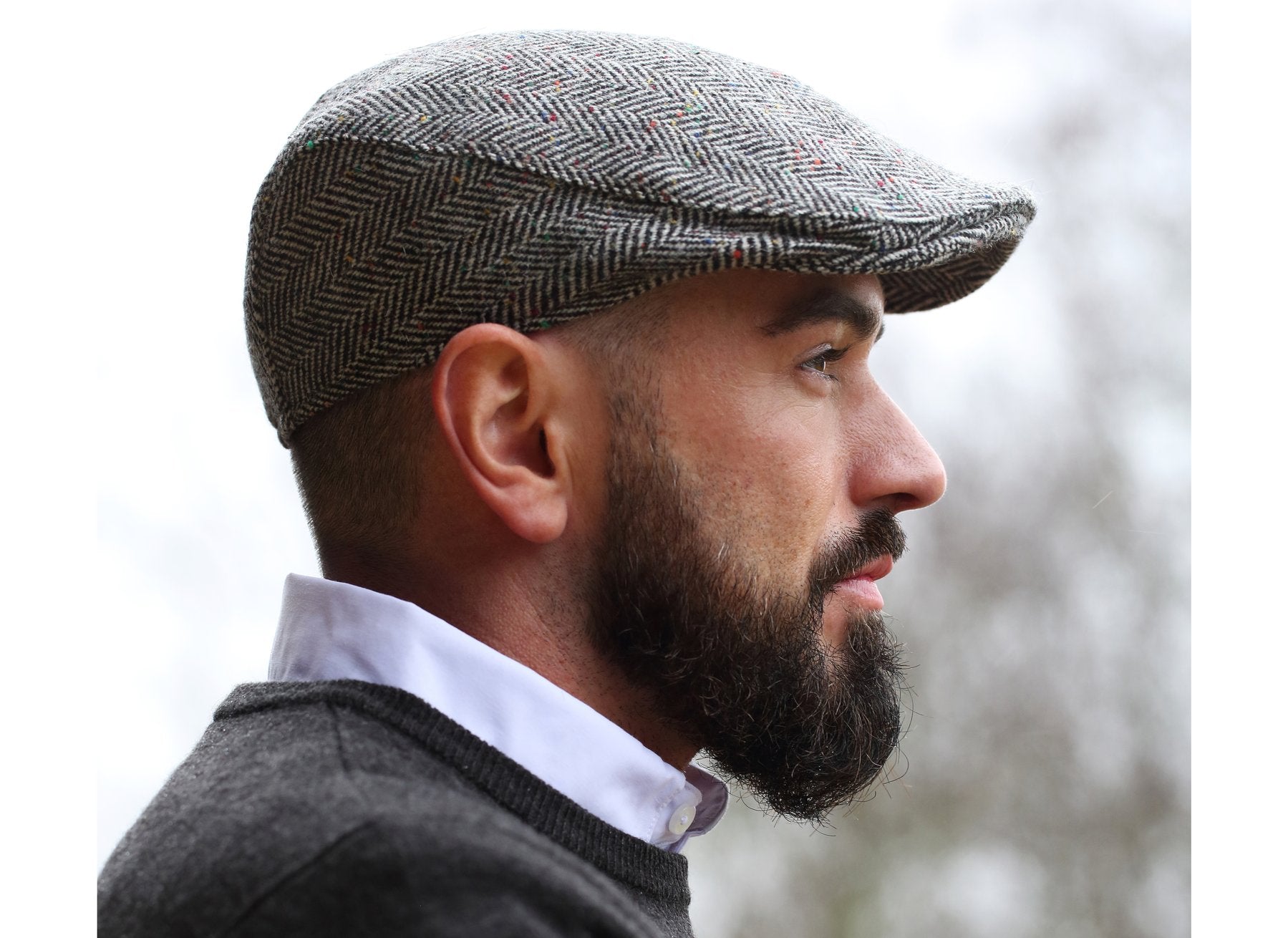 Man wearing a Tweed Donegal Touring Cap by Hanna Hats
