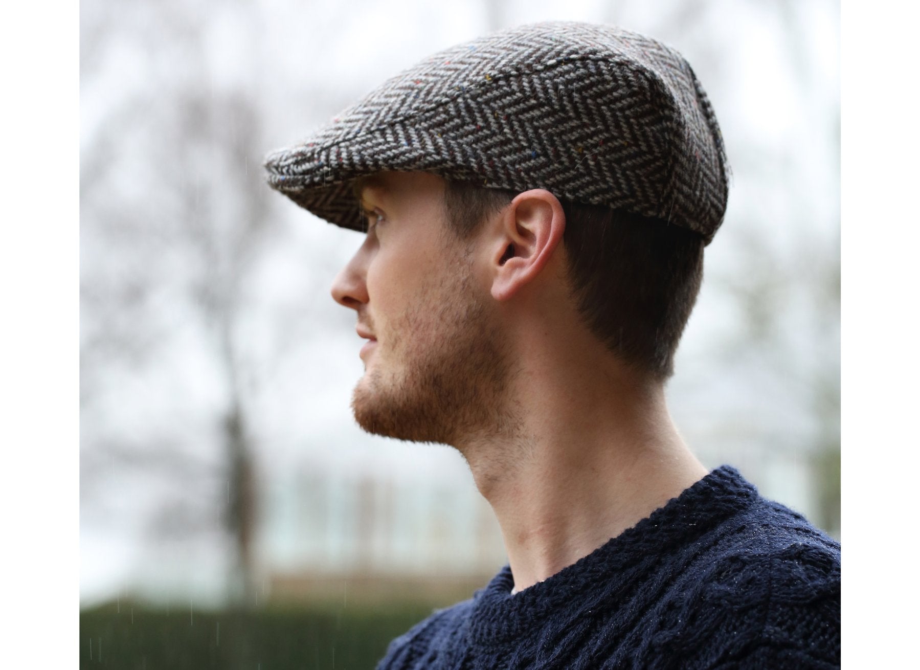Man wearing a Tweed Donegal Touring Cap by Hanna Hats