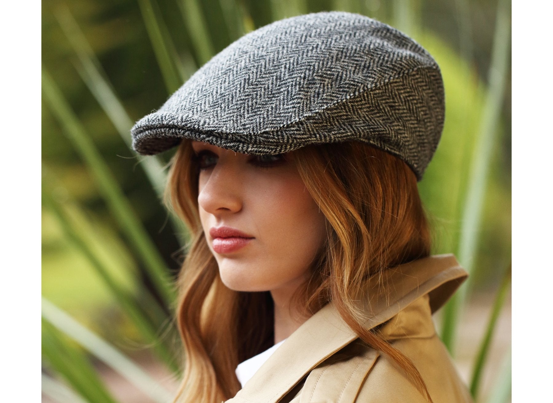 Woman wearing a Tweed Donegal Touring Cap by Hanna Hats