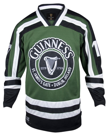 Front Image of the Guinness Green Hockey Jersey, Long sleeve, mostly dark green with some black and white stripes on the arms and sleeves, an embroidered harp on the chest in the center and the word Guinness above it and St. James Gate, Dublin below it.